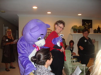 Soroptimist members are visited by Hands and Words Bear